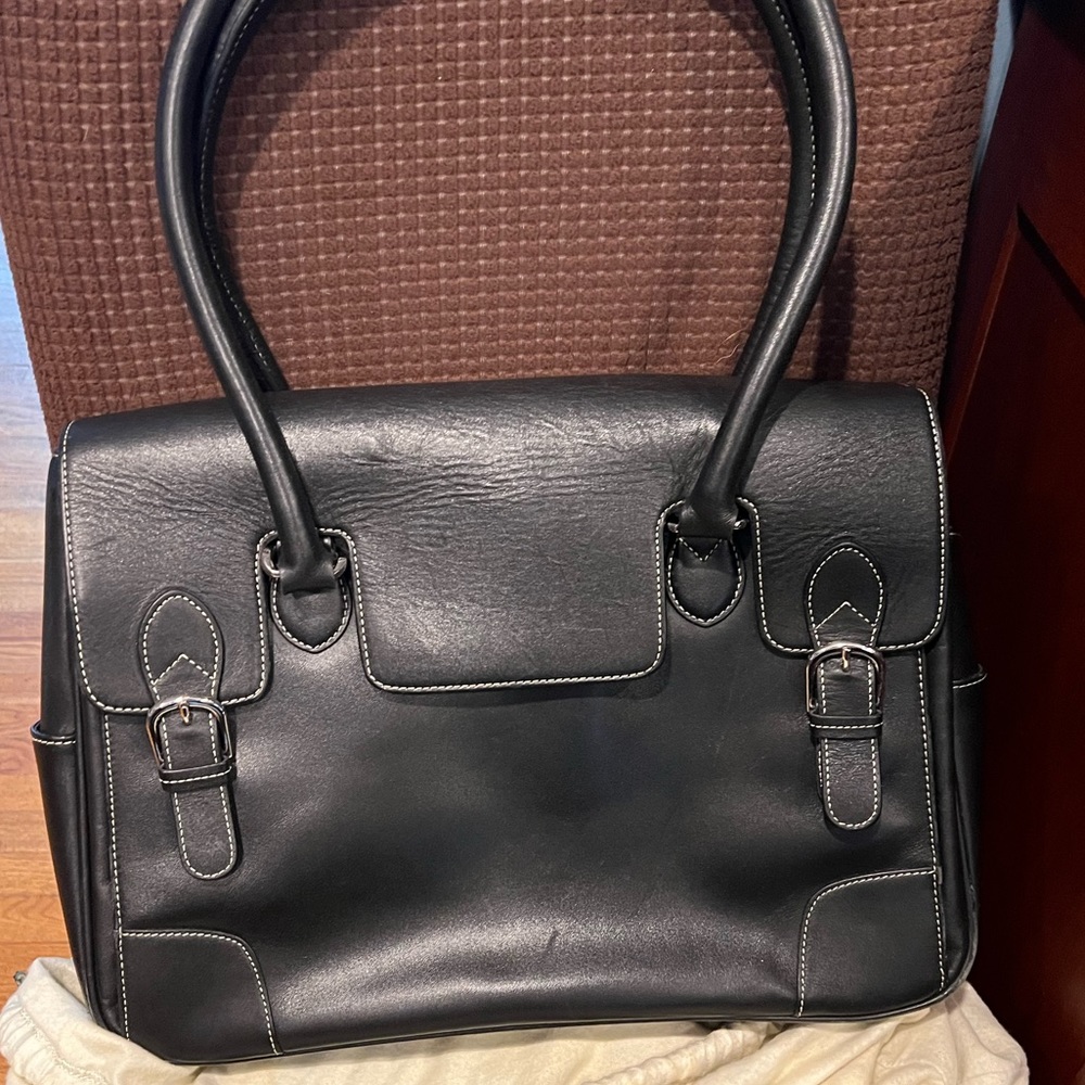 Levenger tote bag. Inside is pristine. Outside has very minor scratches.